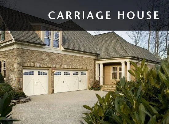 Amarr Carriage House garage doors on a stone home
