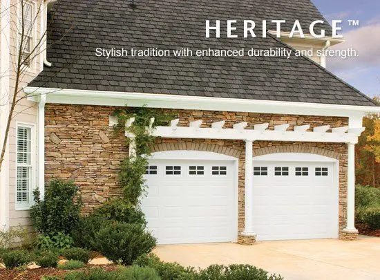 Amarr Heritage garage doors on a brick and stone home