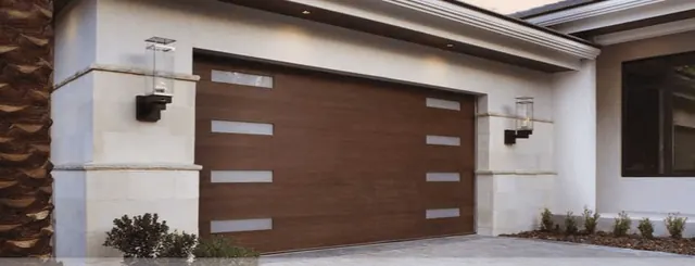 Modern garage door with a dark wood-look finish and horizontal windows